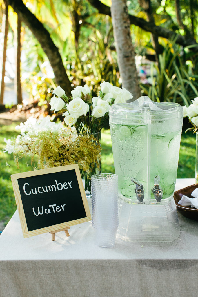 Green on green — cucumber water is a bright addition to a lush outdoor setting.