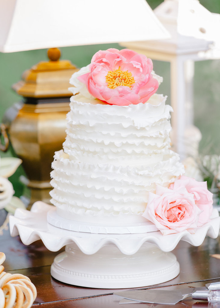 There's something so sweet about this simple but beautiful cake — the ruffles and flowers make a perfectly classic combo.