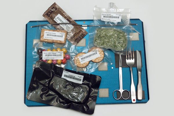 A FOOD TRAY FROM ABOARD A SPACE SHUTTLE